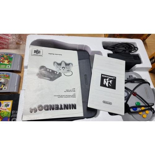 9 - Boxed Nintendo 64 games console complete inc controller along with one other boxed controller and 6x... 