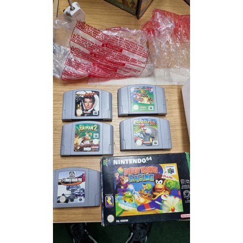 9 - Boxed Nintendo 64 games console complete inc controller along with one other boxed controller and 6x... 