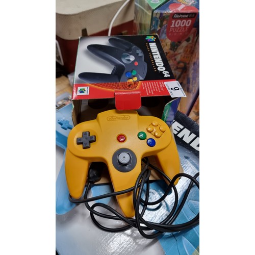 9 - Boxed Nintendo 64 games console complete inc controller along with one other boxed controller and 6x... 