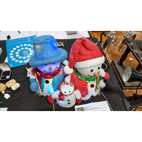 20 - Three piece Christmas cotton snowman family lights figure wich flashes multi coloured lights in exce... 