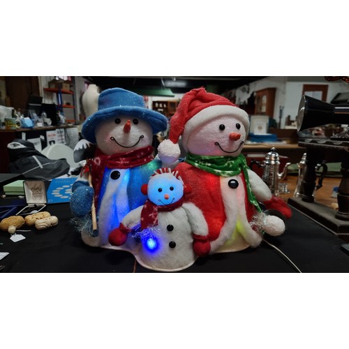 20 - Three piece Christmas cotton snowman family lights figure wich flashes multi coloured lights in exce... 