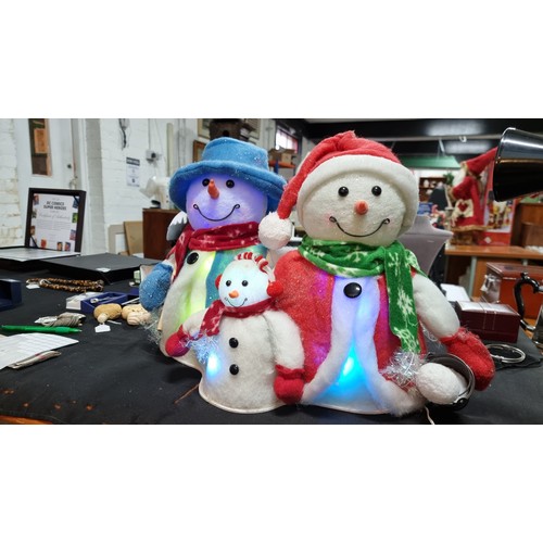 20 - Three piece Christmas cotton snowman family lights figure wich flashes multi coloured lights in exce... 