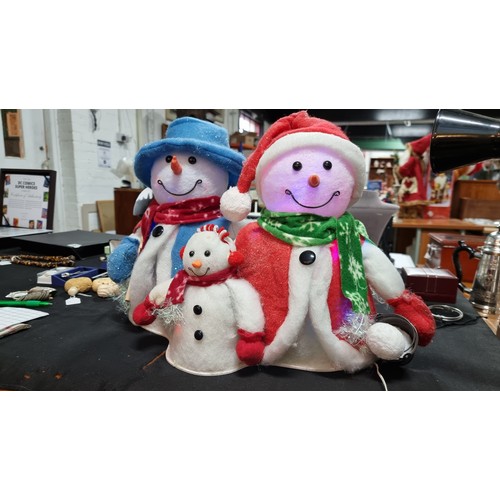 20 - Three piece Christmas cotton snowman family lights figure wich flashes multi coloured lights in exce... 