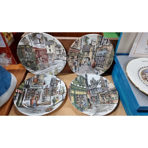 19 - Quantity of 8x Royal Doulton Christmas themed collectable plates from the Window Shopping Collection... 