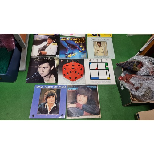 27 - Large quantity of various vinyl records inc good artist and bands Paul Young Michael Jackson AC/DC T... 