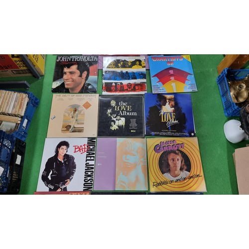 27 - Large quantity of various vinyl records inc good artist and bands Paul Young Michael Jackson AC/DC T... 