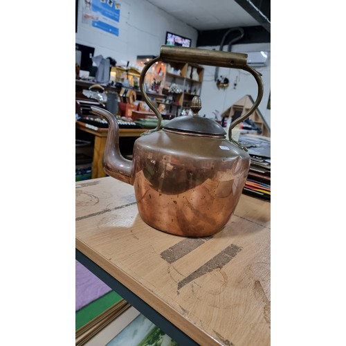 30 - Large antique copper kettle in good condition with a brass handle height of 32cm length 33cm with sp... 