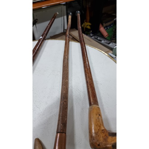 39 - Quantity of 4x vintage walking sticks 3 with rams horns handles one includes a briar wood stem talle... 