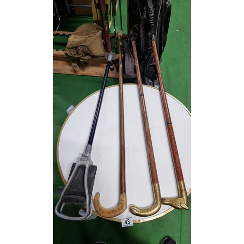 43 - 3x vintage walking sticks and a shooting stick inc 2x with brass handles the other has a rams horn h... 