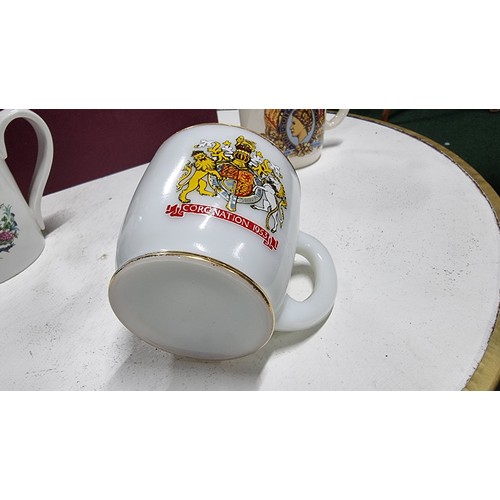 55 - Quantity of 8 various royal commemorative mugs inc an opaline glass mug