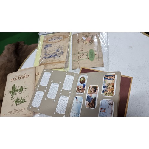 63 - Quantity of 7 various cigarette card albums all complete inc railway engines, Sea fish, Golden age o... 