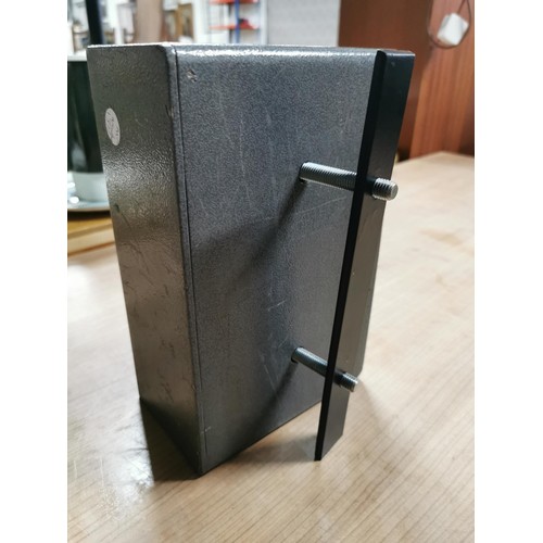 132 - Strong metal safe with key ideal for hanging on a wall complete with wall bracket. Measures 25cm hei... 