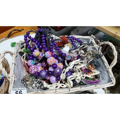 66 - 2x baskets containing a large quantity of various costume jewellery