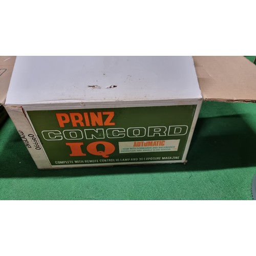 77 - Boxed Prinz concord IQ 35mm colour slide projector along with 3 slide magazines 2 near full with 200... 