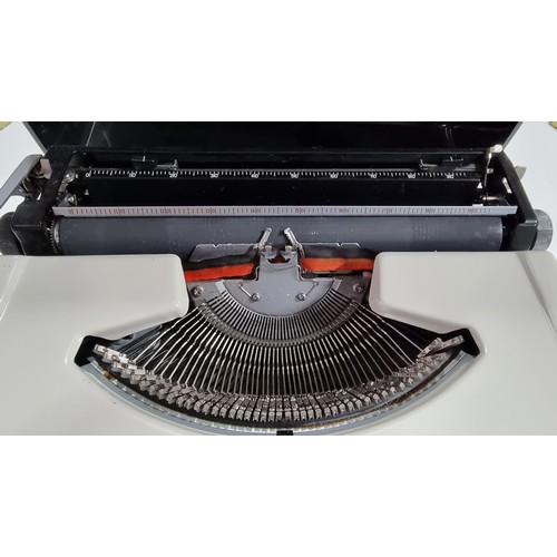 80 - Cased Brother 210 typewriter in good condition