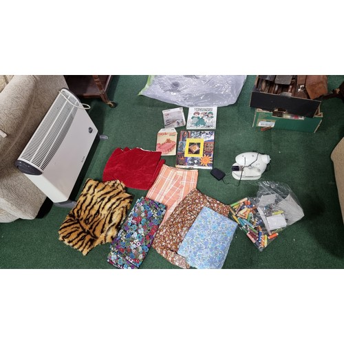 82 - Bag full of craft items inc Hyundai sewing machine sewing patterns books and a quantity of fabric