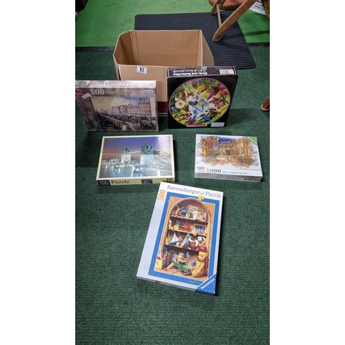 83 - Large quantity of various jigsaw puzzles 2 are new and sealed