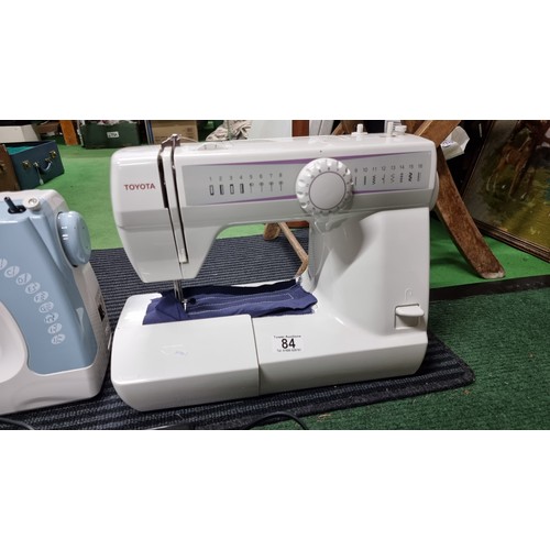 84 - 2x modern sewing machines inc a toyota RS200 series 2000 sewing machine both in working condition Ar... 