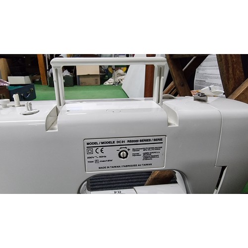 84 - 2x modern sewing machines inc a toyota RS200 series 2000 sewing machine both in working condition Ar... 