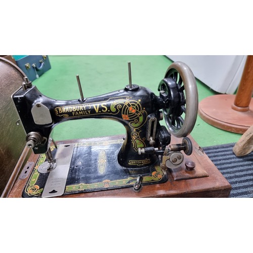 85 - Antique cased sewing machine by Bradbury's Family V.S, complete with motor and light to convert in g... 