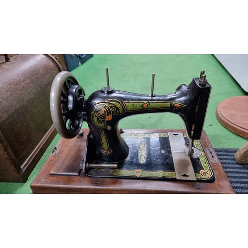 85 - Antique cased sewing machine by Bradbury's Family V.S, complete with motor and light to convert in g... 