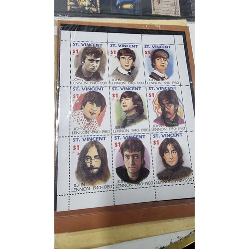 257 - Quantity of mint stamp sets inc The Beatles St Vincent stamps, 4x Royal Mail Millennium stamps Spiri... 