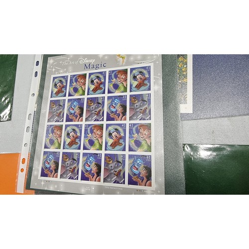 262 - Large quantity of various american mint stamps and stamp blocks inc disney stamps film character sta... 