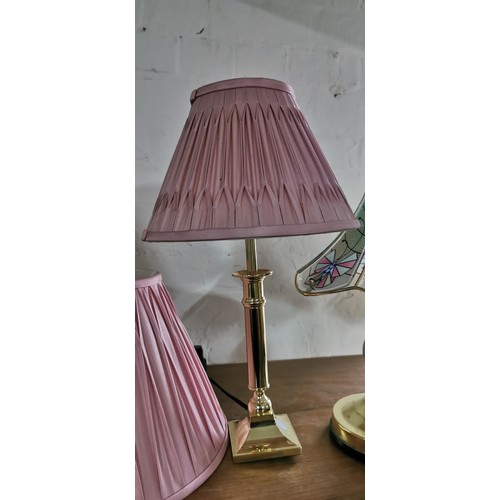 175 - 2x modern brass table lamps with pink shades & a spare pink shade. Measures 45cm height.