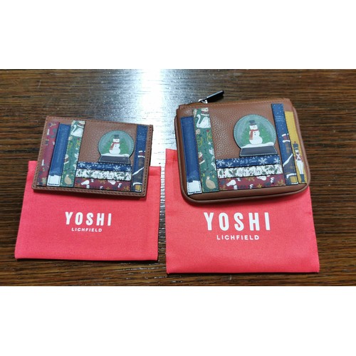 176 - Brand new leather Yoshi christmas themed handbag with dust cover and matching purses along with a re... 