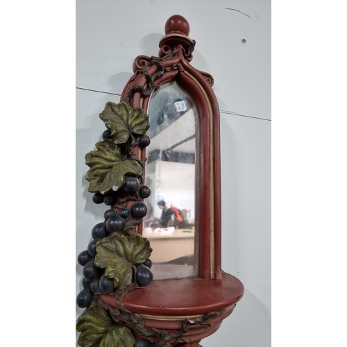 216 - Pair of large ornate matching wall hanging mirrors with a grape vine design by Wigglesworth, one gra... 