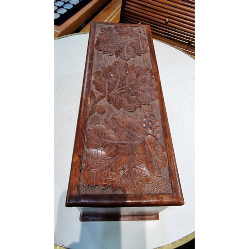 291 - Vintage solid mahogany box with a carved autumn leaf design to the top would also fit a wine bottle ... 