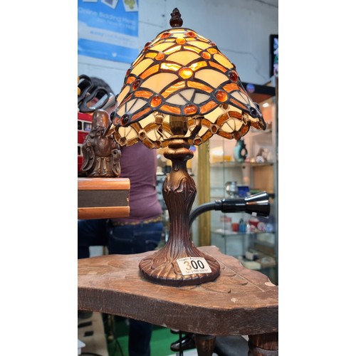 300 - Tiffany style table lamp with a stain glass shade in excellent condition fully working height 36.5cm... 