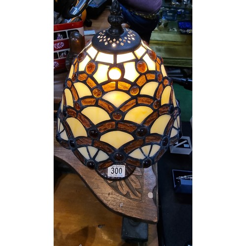 300 - Tiffany style table lamp with a stain glass shade in excellent condition fully working height 36.5cm... 