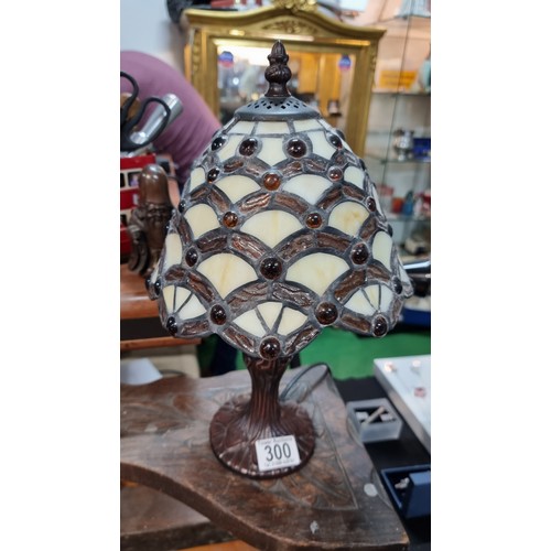 300 - Tiffany style table lamp with a stain glass shade in excellent condition fully working height 36.5cm... 