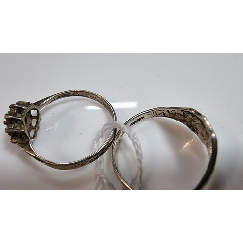 304 - 2x 925 silver rings one inset with clear cz stones one is marked 925 the other marked silver Size N ... 