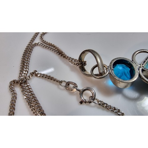 309 - Large ornate 925 silver pendant inset with a turquoise stone and 2x blue stones set on a good 16in 9... 