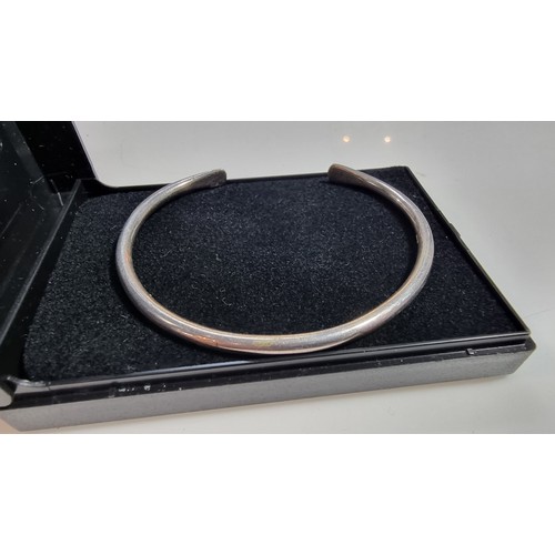 311 - Hallmarked silver torque bangle in excellent clean condition boxed has a weight of 10.8g