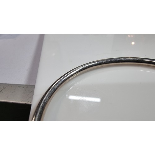 311 - Hallmarked silver torque bangle in excellent clean condition boxed has a weight of 10.8g