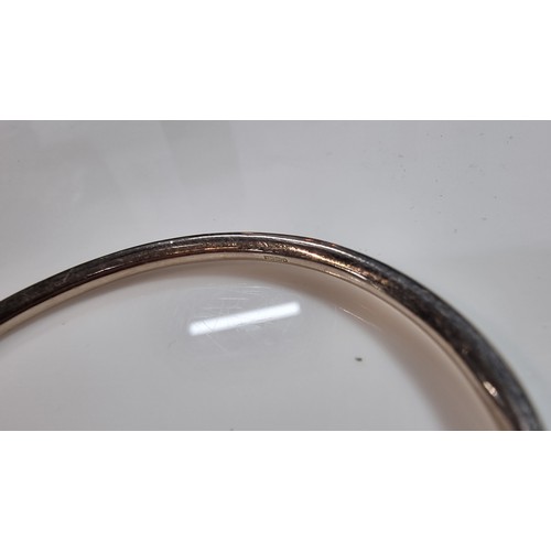 311 - Hallmarked silver torque bangle in excellent clean condition boxed has a weight of 10.8g