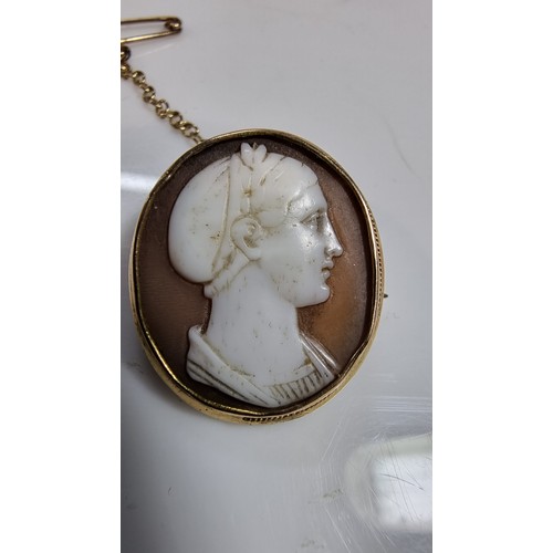 314 - Antique 14ct gold plated cameo brooch with a white portrait of a man looking right portrait seems to... 