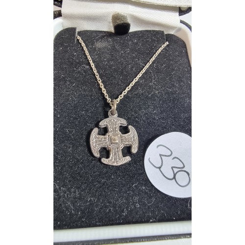 329 - 925 sterling silver welsh pendant on an 18in chain set in its original box in good clean condition