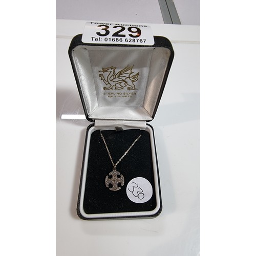 329 - 925 sterling silver welsh pendant on an 18in chain set in its original box in good clean condition