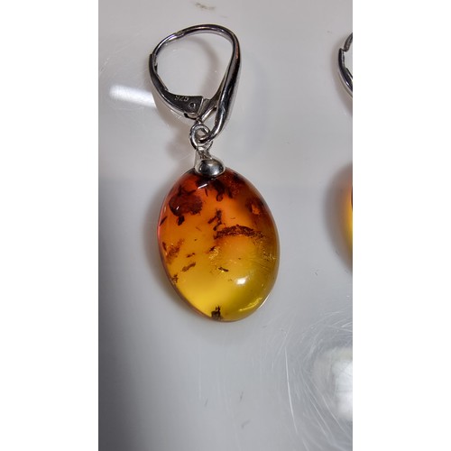 335 - 2x pairs good quality 925 silver drop earrings in set with genuine natural baltic amber one pair has... 