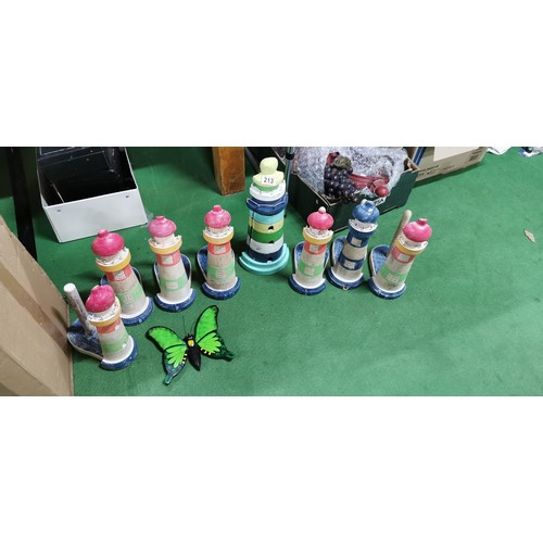 214 - Quantity of hand painted wooden lighthouse bathroom ornaments inc toilet roll holders, key cupboard ... 