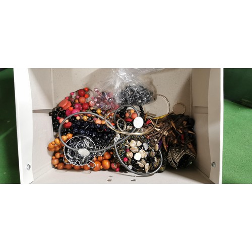 215 - Very large quantity of various costume jewellery in 2x jewellery boxes, both full of jewellery.