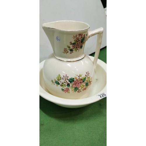 220 - Vintage floral ewer and bowl along with a matching soap dish.