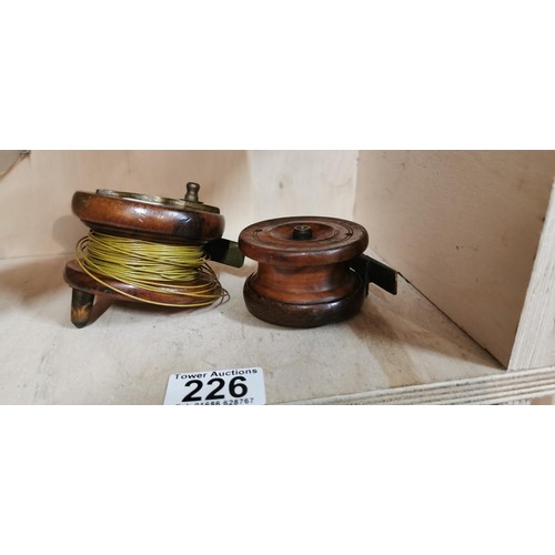 226 - 2x collectable vintage wooden fishing reels in good clean order.