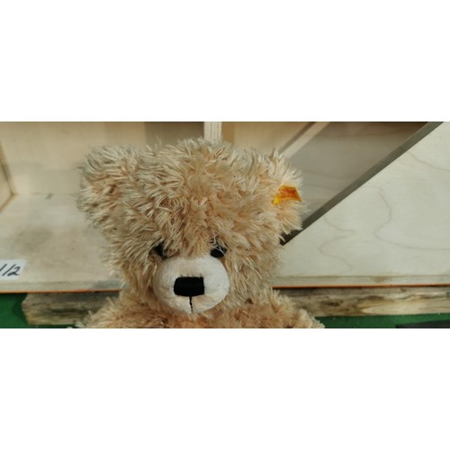 233 - Vintage Steiff brown bear in very good condition with yellow tag and gold button to the ear. Height ... 