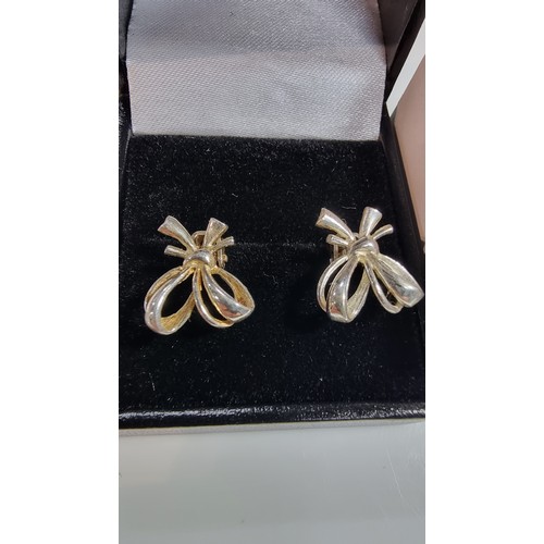 350 - Pair of pretty 925 silver bow formed clip on earrings in clean condition marked 925 fitted in a good... 