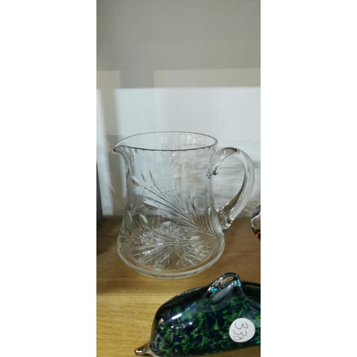 236 - Quantity of 3x excellent quality glassware pieces inc heavily etched glass jug, blown coloured glass... 